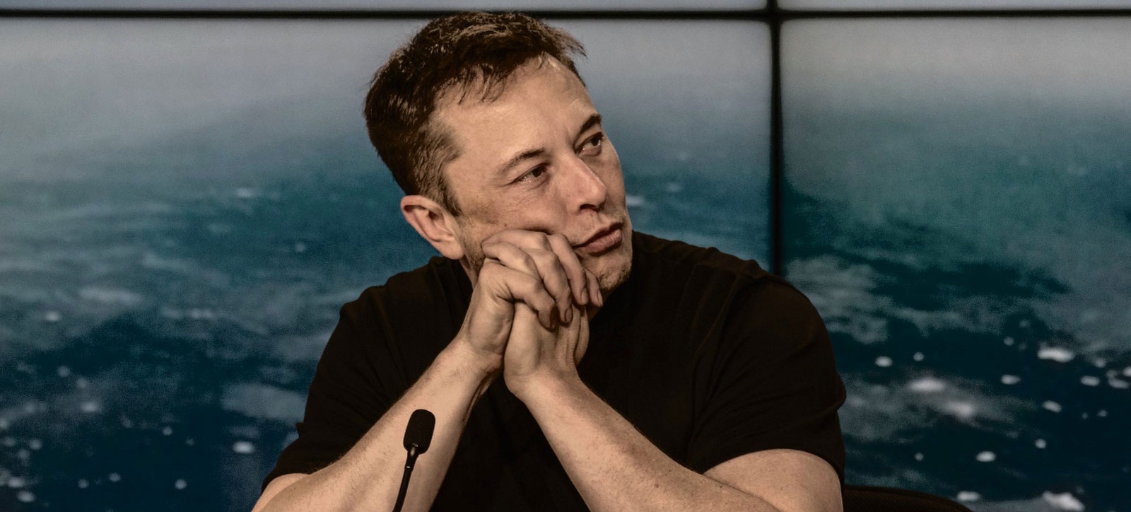 Elon Musk at a press conference. Published under creative commons.