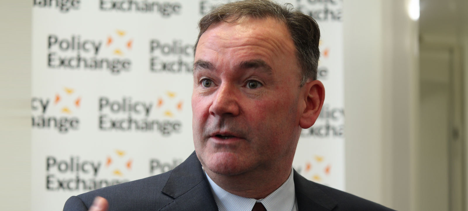 A photograph of Jon Cruddas MP speaking at a Policy Exchange event. Copyright is owned by the Policy Exchange and the image is shared with permission for use under creative commons.