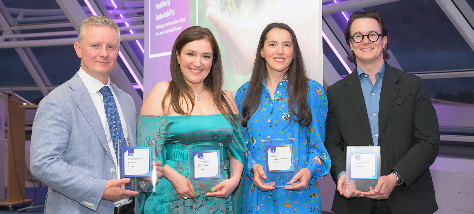 The Alumni award winners Bryn Davies, Elham Fardad, Sorina Constantinescu, and Toss Grumley with their trophies