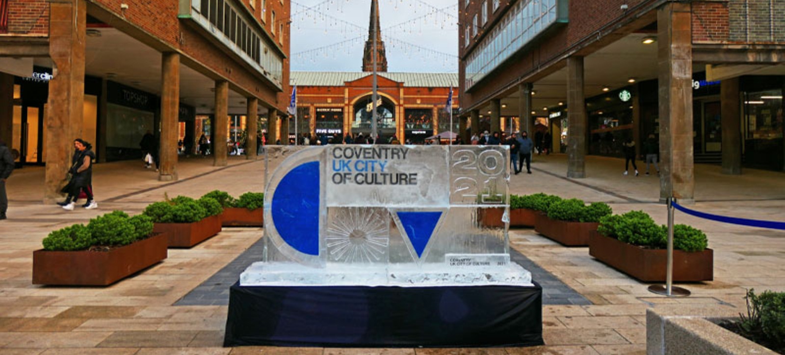 A picture of the Coventry City of Culture logo in the Coventry city centre shopping precinct