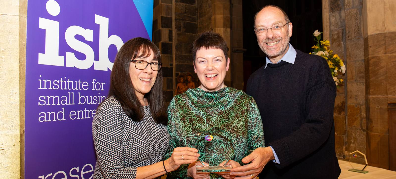 Winners: (l-r) The School's Maria Wishart, Lorna Treanor, President of Institute for Small Business and Entrepreneurship, and Stephen Roper, Director of the Enterprise Research Centre, with an award